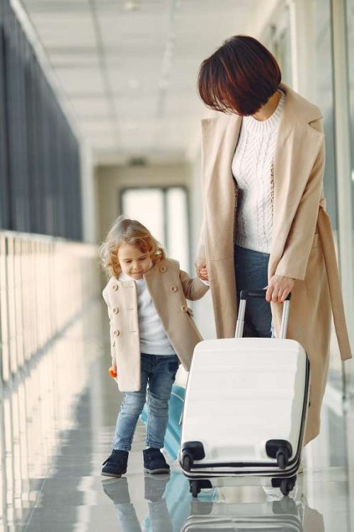 Mother with daughter at the airport
